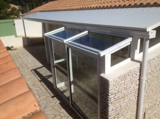 Toiture abri coupe vent