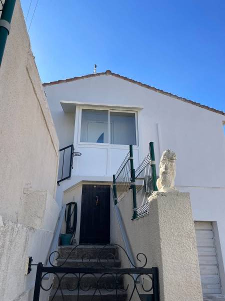 Pose d'une véranda en aluminium laqué blanc à Aix en Provence